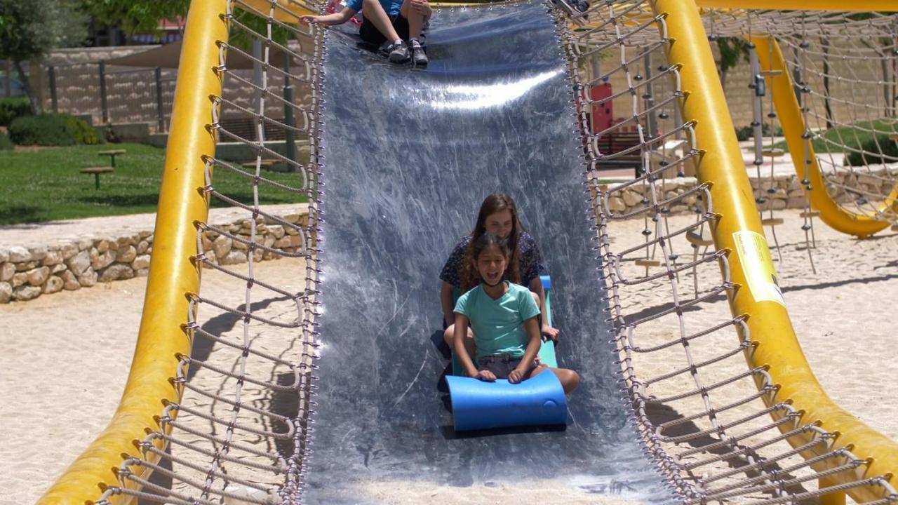 The Physics of a Playground Slide